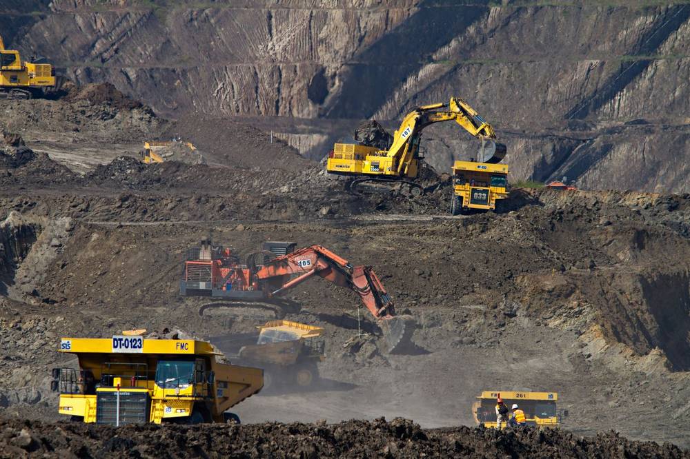 Excavator working a mining site
